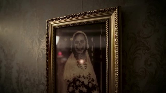 Creepy photo with bride and skeleton.