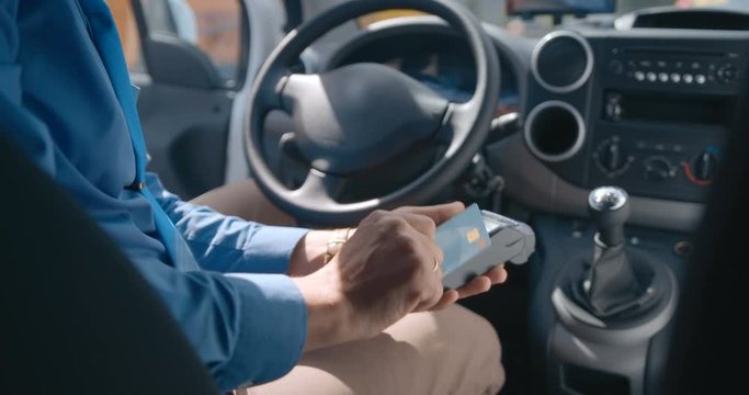 The driver pays for the service by rolling the card through the mobile terminal 