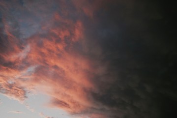 Naklejka na ściany i meble A dramatic evening cloudy sky