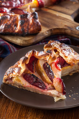Portion of galette with pears and plums