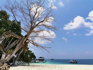 Beautiful blue sky and crystal clear water in Sipadan Island, Semporna. Sabah, Malaysia. Borneo. The Land Below The Wind.