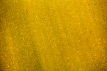 abstract gold and white bokeh and bubbles in the water