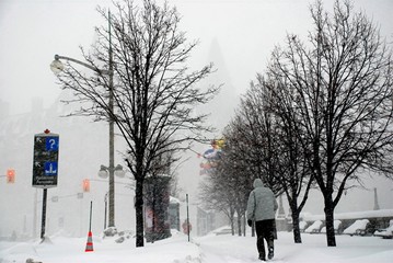 Man walking in Blizzard in Ottawa, Canada