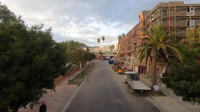 Slow Motion Push towards Sunset Boulevard by Construction Site in Hollywood