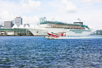 Water shuttle taking off in Miam by cruise ship