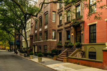 Brownstone facades & row houses at sunset in an iconic neighborhood of Brooklyn Heights in New York...