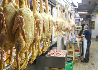 Lima, Peru - Nov 17, 2019:  Freshly butchered Chicken and Turkey on sale in the Mercado Central