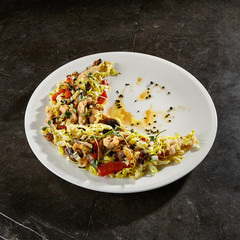 Chinese cabbage salad on white plate