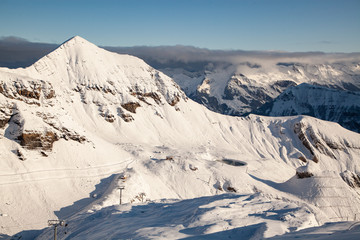 amazing snow covered peaks in the Swiss alps Jungfrau region from Schilthorn