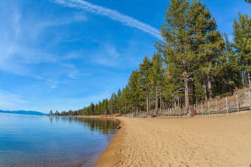 Lake Tahoe with lake in the left and sand in the right