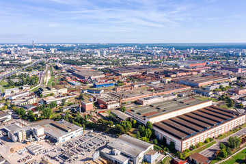 Fototapeta na wymiar aerial panoramic photo of city industrial district with factories, warehouses and manufactures