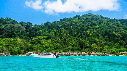 Fototapeta na wymiar Panorama beautiful nature scenic landscape Morgan village with speed boat for traveler Mu Koh Surin national park, Andaman sea Phang-Nga, Tourist travel Phuket Thailand, Tourism destination Asia