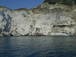 Fototapeta na wymiar milos island in greece, kleftiko bay rock caves, sea swimming sailing in summer holidays