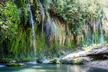 The Kursunlu Waterfall Nature Park in Antalya, Turkey. The waterfall is on one of the tributaries of the Aksu River  and situated in the midst of a pine forest 