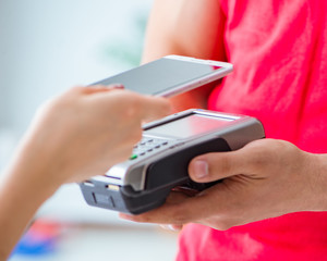 Concept of paying with POS terminal