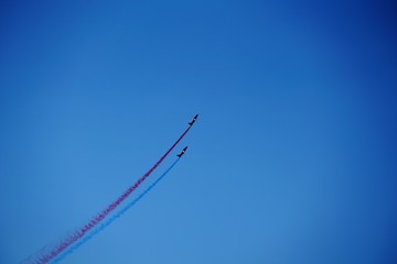 airplane flying in the sky with clouds