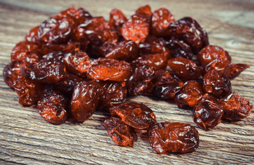 Cranberries as source minerals and fiber. Wooden background