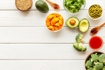 Healthy food. Vegatables and fruits on white wooden background top view frame copy space