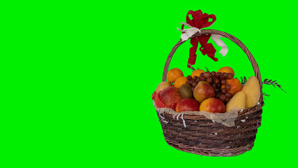 Many fruits in a basket with a green background for a New Year's gift