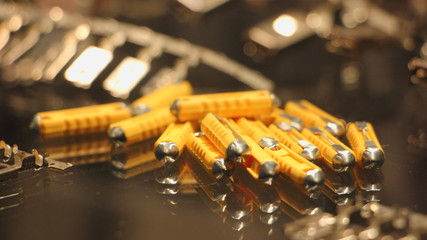 Car yellow cylinder fuses old type close up