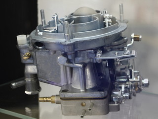 Obraz na płótnie Canvas New car carburettor close up, vehicle engine fuel system maintenance