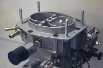 New double chamber car carburetor close up, vehicle engine fuel system maintenance