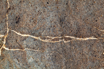 Granite stone texture with fine grain of white broken lines