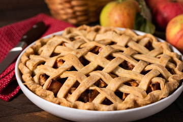 Apple Pie With Whole Wheat Lattice Crust In Baking Dish. Closeup View. Traditional American Fall...