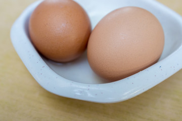 Two soft boiled egg in a bowl