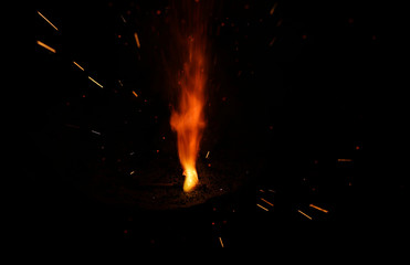 Fototapeta na wymiar Beautiful Diwali Glowing Firecracker, fire of cracker explosion on black background