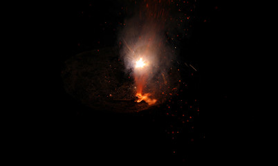 Beautiful Diwali Glowing Firecracker, fire of cracker explosion on black background