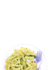 plate of pasta with copy space on white background, top view