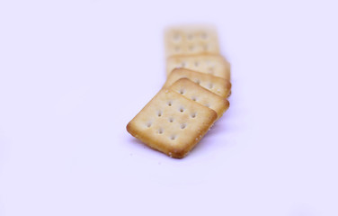 Stack of biscuits isolated on white background
