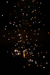 Fototapeta na wymiar Fire crackers or fireworks in the sky. celebrating new year and Christmas and Diwali