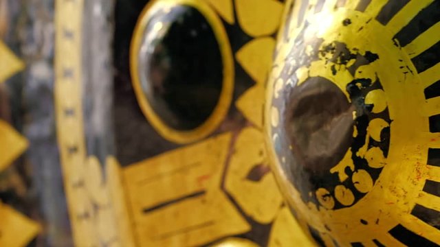 Hitting the oriental gong in thai buddhist temple