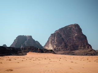 Rocky outcrops in the desert of Wadi Rum in the morning