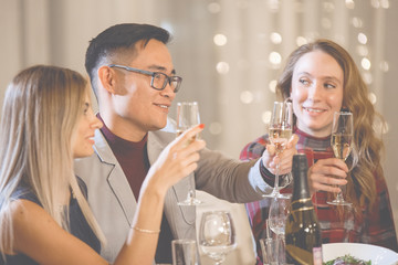 Friends at holiday table.