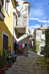 Civitanova del Sannio, 11/23/2019. A narrow street among the old houses of a mountain village in the Molise region