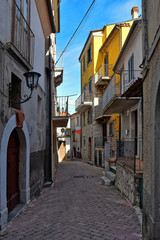 Civitanova del Sannio, 11/23/2019. A narrow street among the old houses of a mountain village in the Molise region