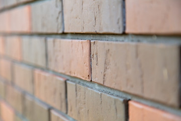 Bricks in the wall of a house as an abstract background