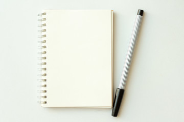 Top view of blank notebook with pencil on with background. Education concept.