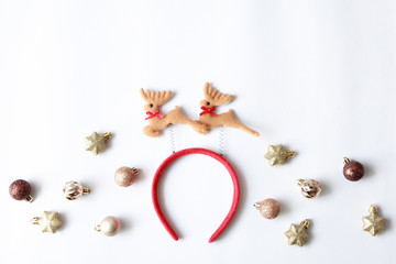 Christmas ornament with fancy headband with reindeer decorative shape for Christmas party and celebration on white background.