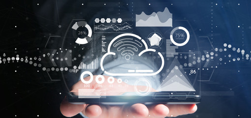 Businessman holding Cloud and wifi concept with icon, stats and data 3d rendering