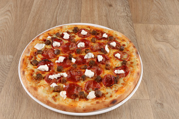 tasty delicious pizza food on a wooden background