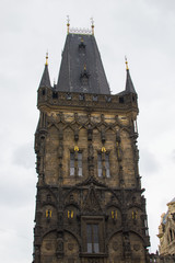 Fototapeta premium Vertical picture of Powder Tower (Prašná brána), a medieval gothic city gate and one of the most significant monuments in Prague, Czech Republic, located in the Republic Square (Náměstí Republiky)