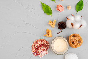 Beautiful composition with cosmetic bottles and spa decorations