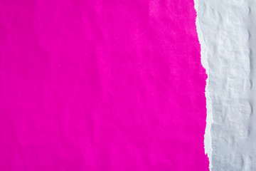 Purple and silver grey crumpled, torn and ripped gloss paper posters on billboard with rough...