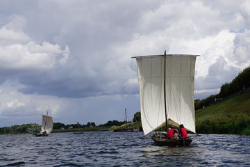 old fashioned wooden flat sailboats on the Loire river, France