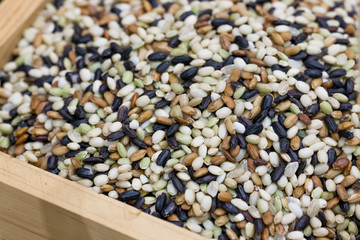 Stack of diferrent rice on basket. various rice isolated