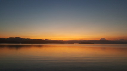 Fototapeta na wymiar dramatic sunset over the sea